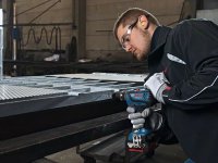 Bosch Kit martello, smerigliatrice e trapano con 2 batterie ProCore 18V, caricabatterie e borsone